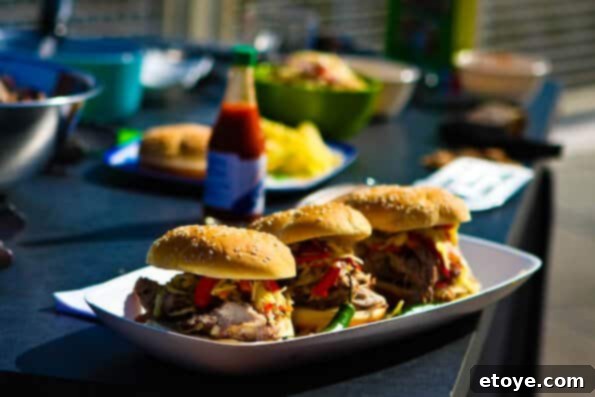 Smoky Carolina Pulled Pork Sandwiches with Zesty Slaw 1 featured 4404