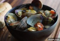 Pub-Style Beer-Steamed Clams with Bacon and Tomatoes