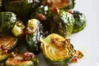 Jeweled Brussels Sprouts with Cranberry-Pistachio Pesto