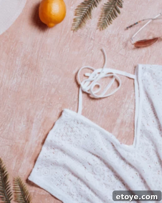 Close-up of lightweight, breathable fabric, emphasizing the importance of suitable clothing for hot weather.