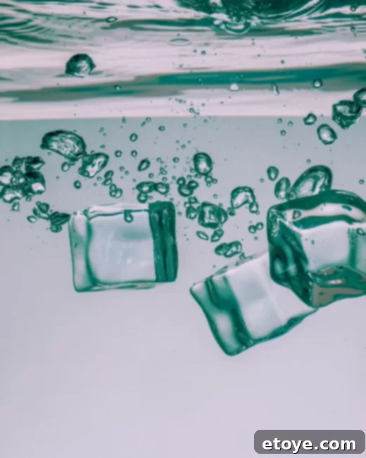 A person demonstrating how to cool down by placing a wet hat on their head, illustrating an instant cooling technique.