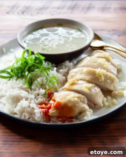 Score a New Rice Cooker 3 Authentic Hainanese Chicken Rice served with fluffy rice and sauces
