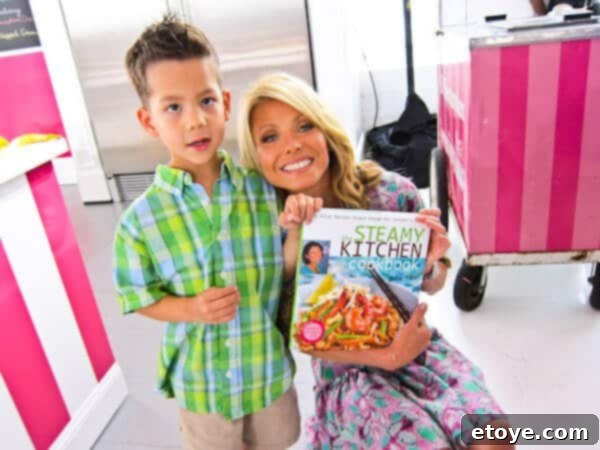 Nathan, Kelly Ripa, and a cookbook lined up, appearing to be of similar width