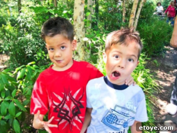 Kids playing energetically, perhaps after a long day of activities