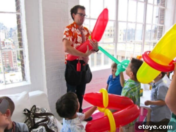 Balloon contortionist entertaining children