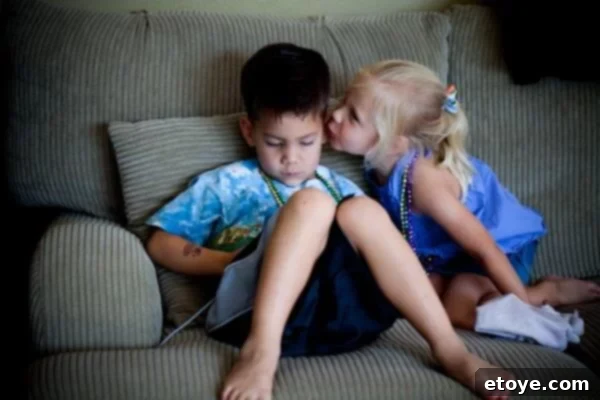 The final moments of anticipation before the resolution of the children's social exchange, building towards a climactic outcome.