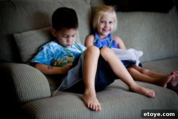 The boy human displays calm disengagement, waiting patiently for the girl's next move in their evolving social interaction.