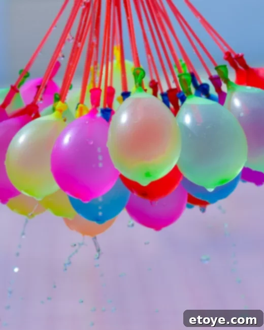 Epic Paddle Board Sweepstakes 7 Family enjoying an intense water balloon fight in a park