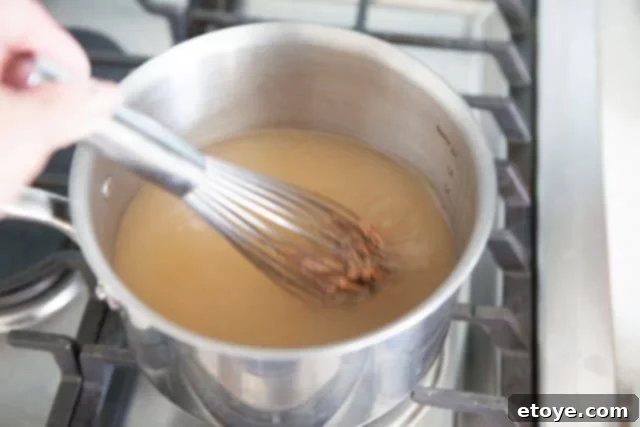 whisk with miso in pot