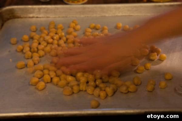 Distribute the oil Crispy Roasted Chickpeas Recipe Distribute Olive Oil Evenly for Crispy Roasted Chickpeas Recipe