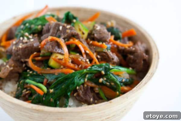 Bulgogi Rice Bowl 14 Korean Beef Rice Bowl served over a bed of white rice