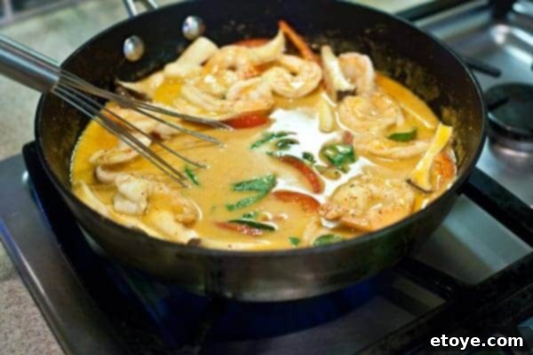 10-Minute Shrimp & Mushroom Thai Curry 11 Fresh basil leaves added to the finished Thai shrimp curry