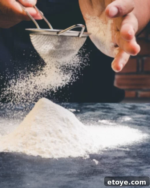 Win Instant Kitchen Upgrades 4 Sifting flour into a bowl