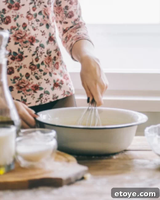 Win Instant Kitchen Upgrades 6 Woman's hands mixing cake batter