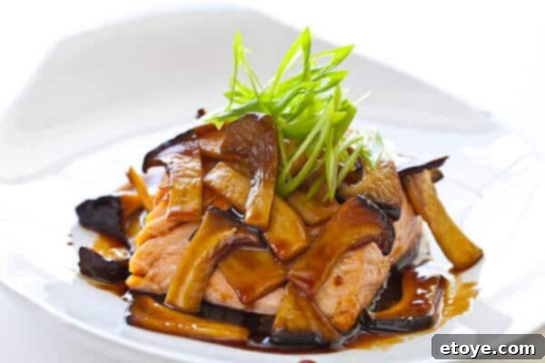 Delicious Salmon and Mushroom Teriyaki dish, ready to serve
