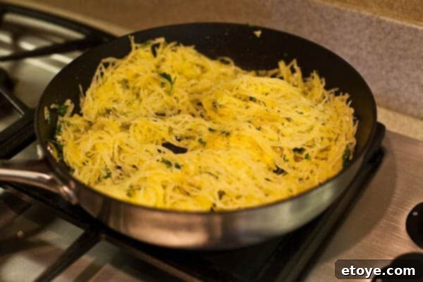 Add squash -Spaghetti Squash Recipe buttered Spaghetti Squash in pan
