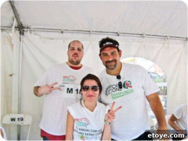 Floria Lee, the victorious women's champion, radiating triumph and accomplishment after winning the dumpling eating contest