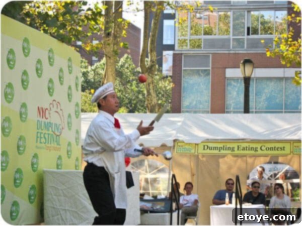 Mr. Yan Xiao Di, a captivating performer from Shanghai, expertly juggling multiple knives on stage