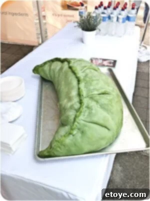 An exquisitely crafted, oversized dumpling, artistically presented and filled with numerous miniature dumplings