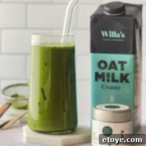 Glass of iced matcha latte.