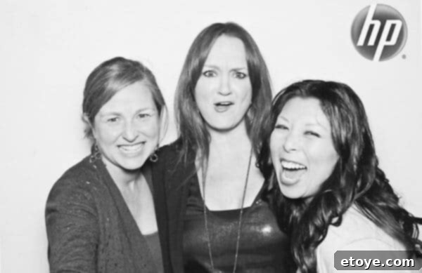 Swine Song 3 Three women, including The Pioneer Woman and Elise, laughing and posing playfully at BlogHer Food 2010