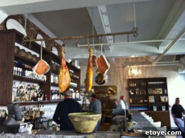 Swine Song 5 A whimsical pig statue or decoration inside a window, discovered in San Francisco