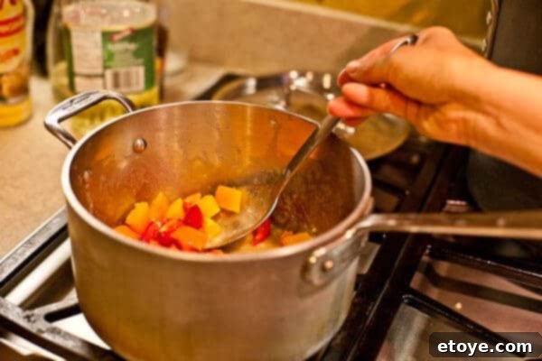 garlic and tomatoes cooking in butter sauce