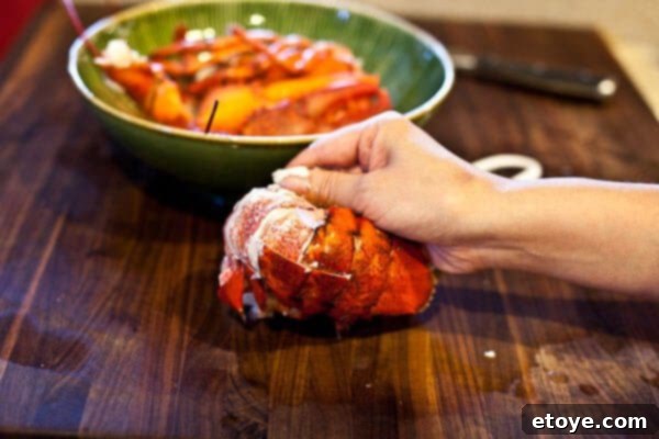 peeling lobster tail meat