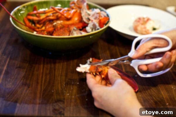 cutting lobster knuckle with shears