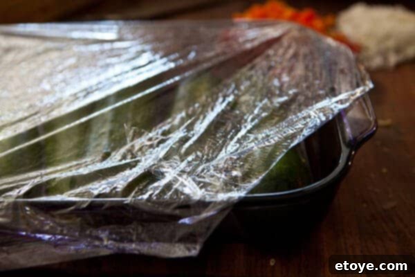 Covering zucchini for microwaving