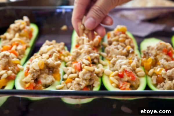 Baked Stuffed Zucchini Boats with pine nuts