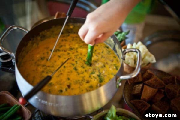 Hearty Spinach Mushroom Bacon Fondue 5 Asparagus spears prepared for fondue