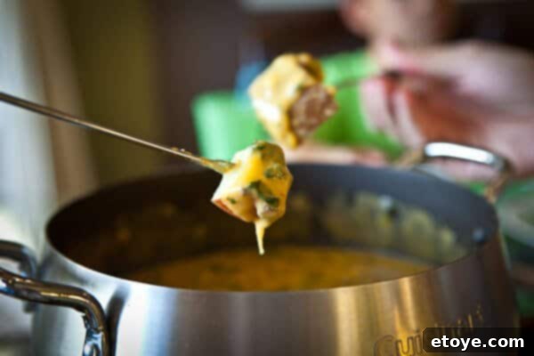 Hearty Spinach Mushroom Bacon Fondue 8 Granny Smith apple chunks ready for dipping