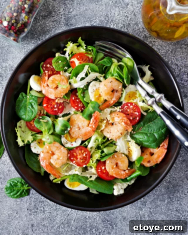Garlic Shrimp in Minutes 3 A fresh salad topped generously with delicious garlic shrimp, ready to be enjoyed.