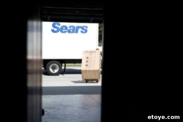 Win a Kenmore Kitchen and Laundry Set 2 Sears Blue Team delivering new Kenmore appliances