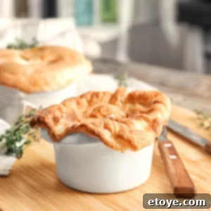 Chicken pot pie in a white ramekin.