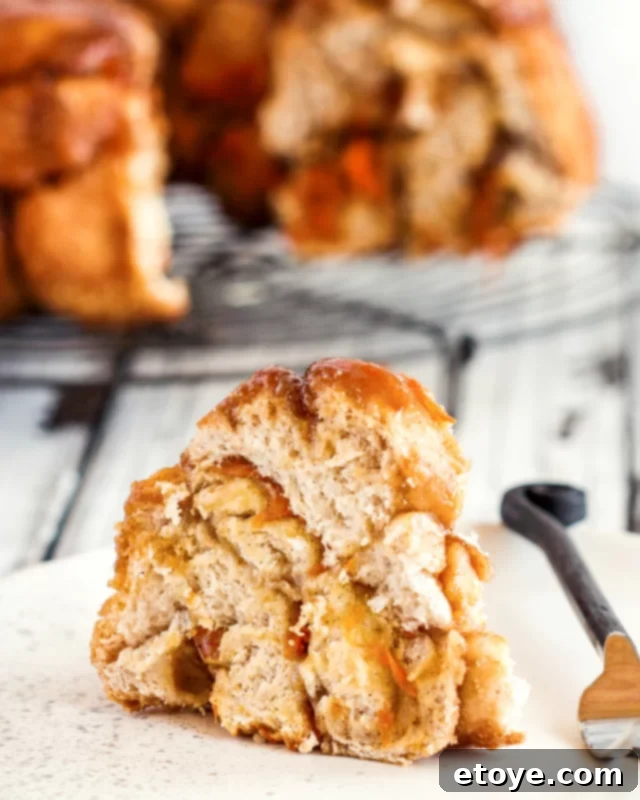 Thick slice of monkey bread on a white plate. 