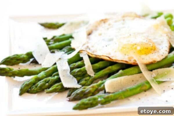 Asparagus with Fried Egg and Parmesan Cheese Recipe Bundle of fresh, high-quality asparagus spears