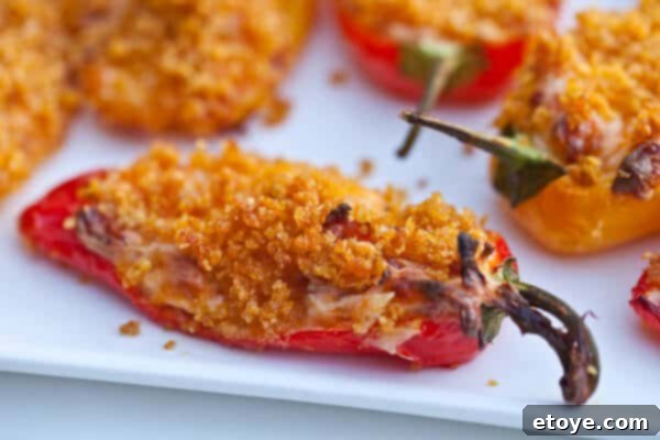 Crispy Baked Jalapeno Bacon Poppers 3 Close-up of a single jalapeno popper, emphasizing its crispy exterior.