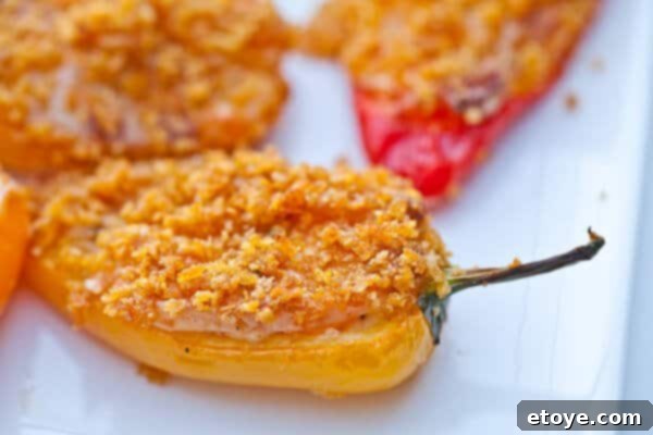 Crispy Baked Jalapeno Bacon Poppers 4 A vibrant platter of appetizers, including various finger foods and dips, at a festive gathering.