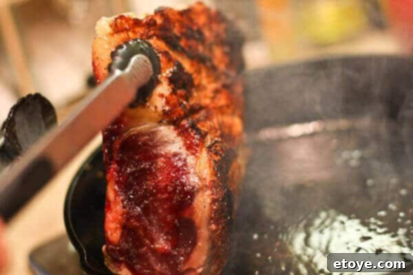 Close-up view of the perfectly seared crust on the prime rib roast.