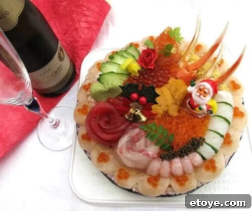 Another view of a beautifully arranged real sushi cake with different types of fish