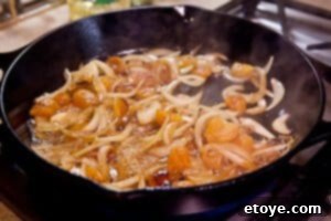 Brandy simmering in the pan to reduce
