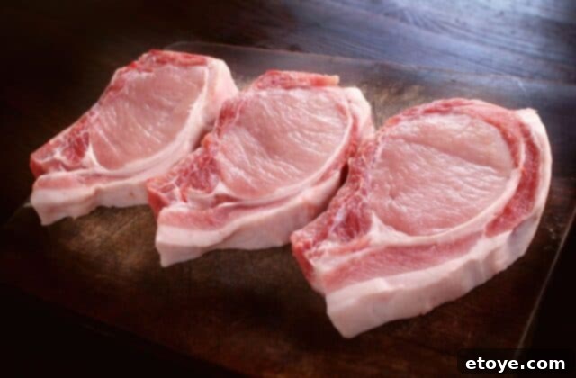 Bone-in rib chop for enhanced flavor and tenderness in pork dishes