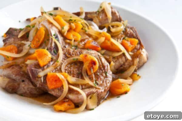 Properly scored pork chops ready for cooking with apricot brandy sauce