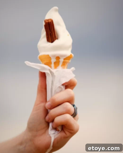 Mini marshmallows at the bottom of an ice cream cone to prevent melting mess