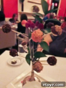 A tower of exquisite Cheesecake Pops at a restaurant