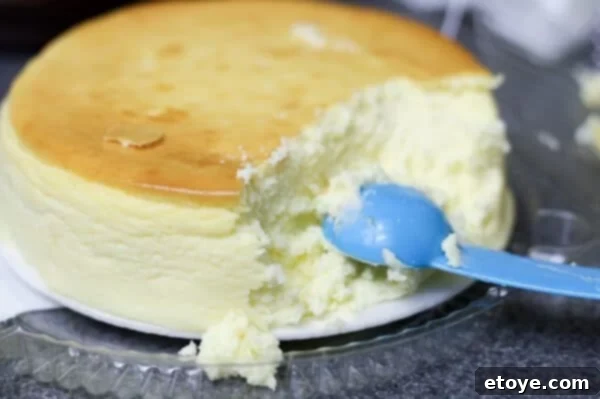 Cheesecake molding process around red velvet cake balls