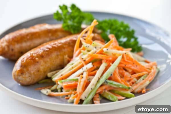 Chicken Sausage & Apple Slaw 13 Plated chicken sausage with fresh apple slaw