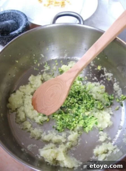 Sautéing aromatics until softened